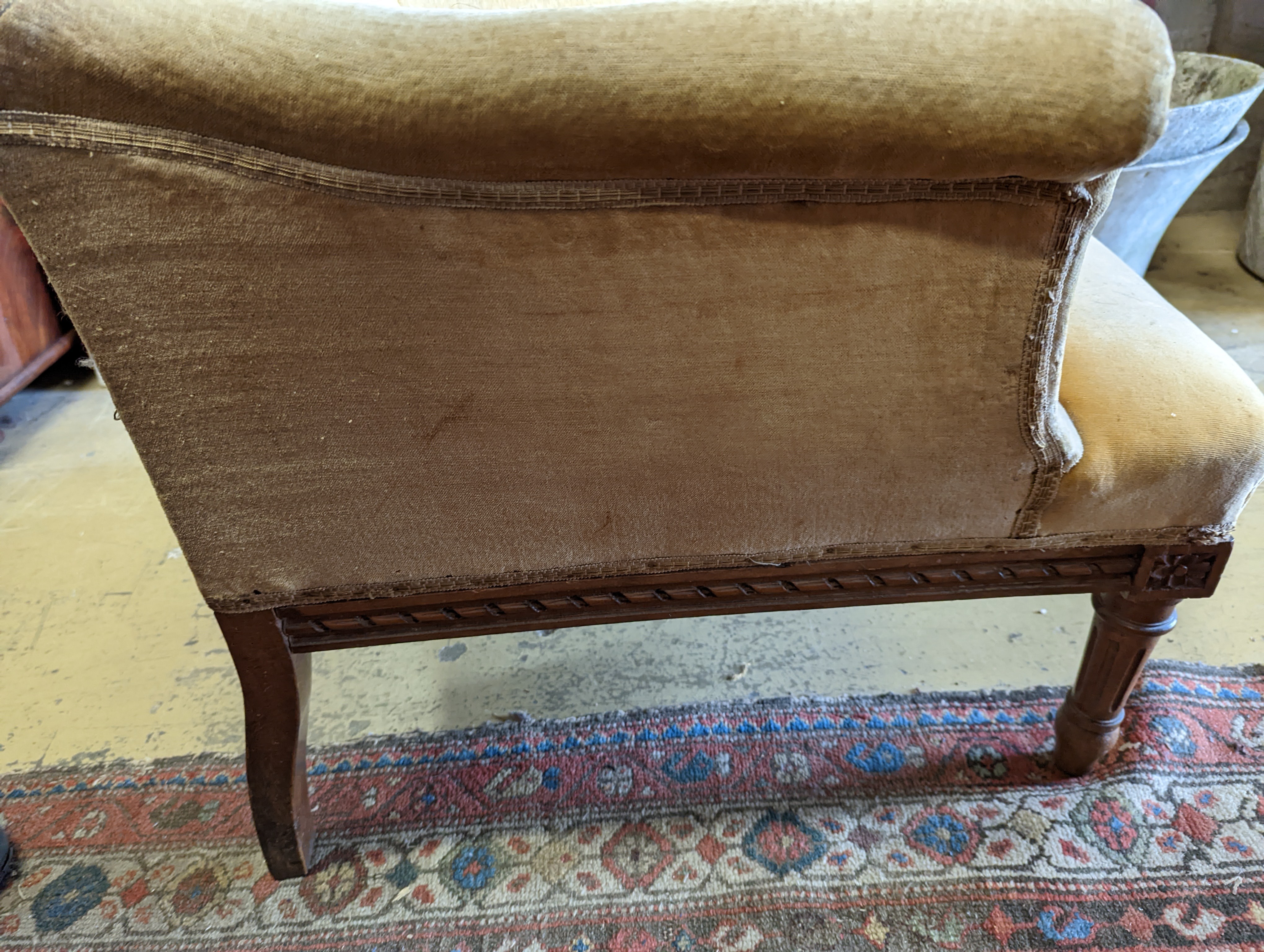 A late 19th century French carved beech armchair